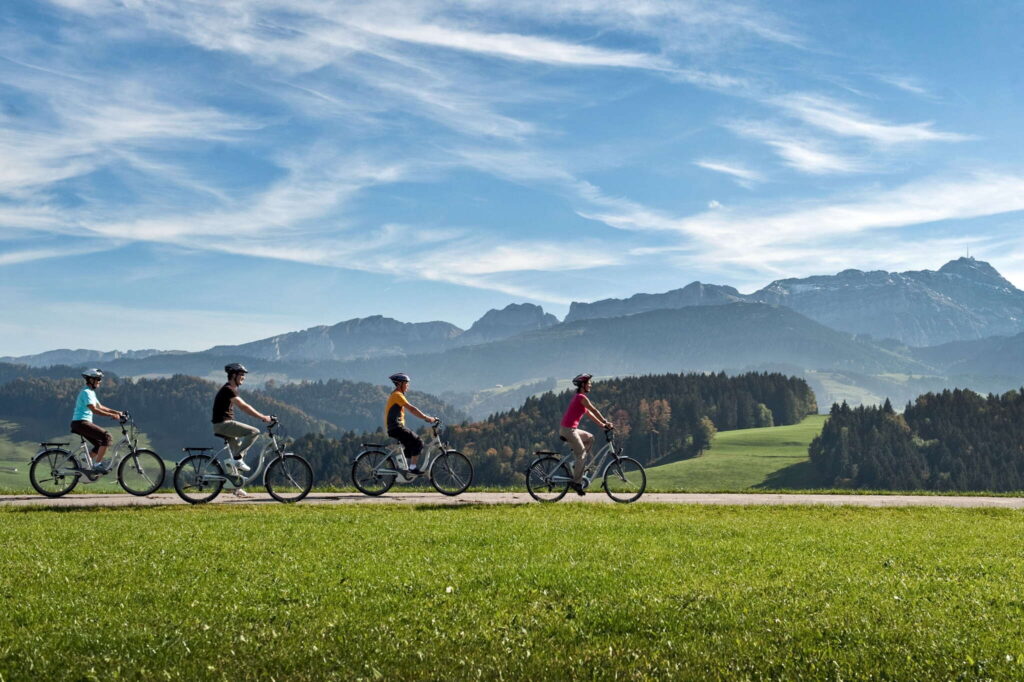 smallest canton in Switzerland has lovely villages, green meadows, and verdant forests that cyclists may enjoy while riding