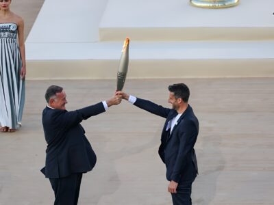 Olympic Flame handed over to Paris 2024